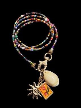 Three Charm Shell Long Beaded Necklace.